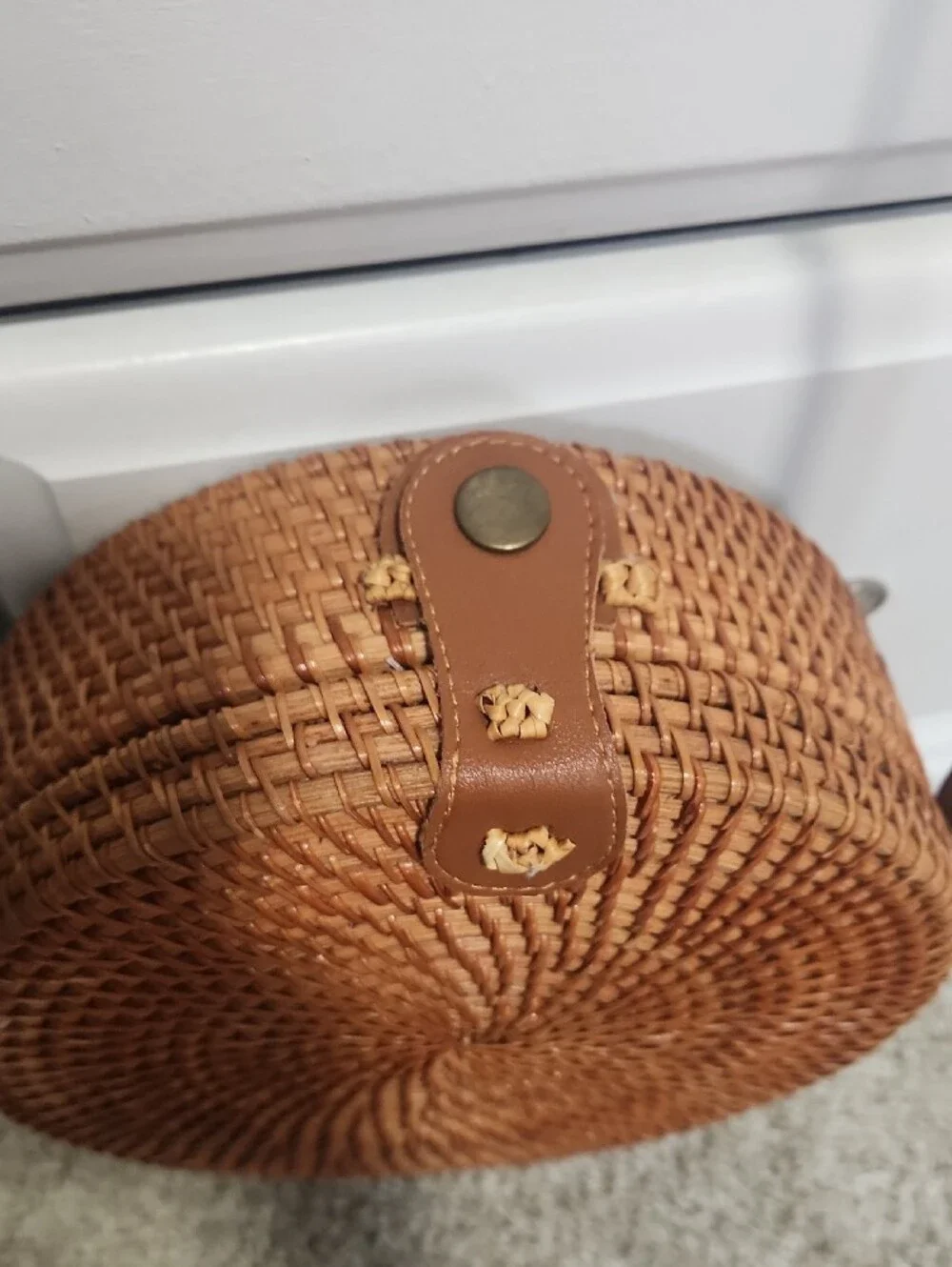Round Woven Crossbody Bag in Brown